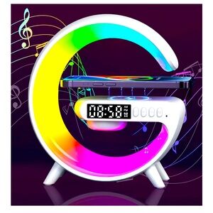 NIB Alarm clock, Wireless Speaker, phone Charger Light,LED Bedside Lamp 4-in-1